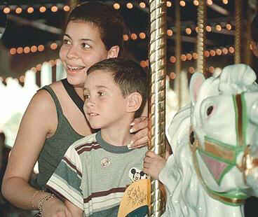 Elian and Marisleysis on carousel